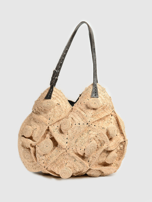 panier en raphia tressé fabriqué à Madagascar tressage artisanal naturel